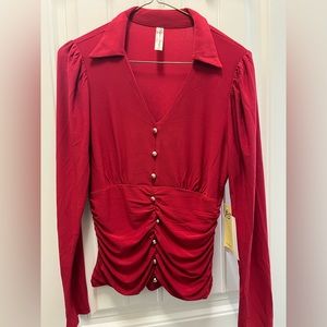 New Women's red long sleeve blouse with silver buttons. NWT